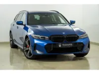 Gebraucht BMW 330e M Sport 292 PS (214 kW) 2022 Portimao blau m (metallic) Kombi