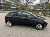 Używany Opel Corsa 69 KM (50 kW) 2013 Czarny Hatchback