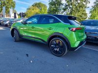 Gebraucht Opel Mokka 131 PS (96 kW) 2023 Lackierung matcha green/typ au SUV