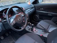 Używany Mazda 3 105 KM (77 kW) 2008 Szary Hatchback