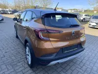 Gebraucht Renault Captur 140 PS (102 kW) 2021 Orange epy+schwarz gne SUV