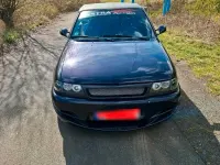 Używany Opel Astra Cabriolet 115 KM (84 kW) 1994 Purpurowy Kabriolet