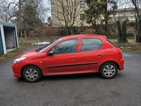 Gebraucht Peugeot 206+ 68 PS (50 kW) 2011 Rot Kleinwagen