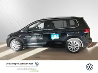 Gebraucht VW Touran Highline 150 PS (110 kW) 2025 Grenadillschwarz Van / Kleinbus