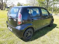 Gebraucht Daihatsu Sirion 69 PS (50 kW) 2011 Schwarz Kleinwagen