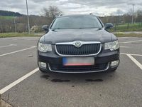 Używany Skoda Superb Elegance 140 KM (102 kW) 2012 Czarny Kombi