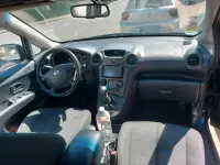 Używany Kia Carens 128 KM (94 kW) 2012 Czarny Minivan