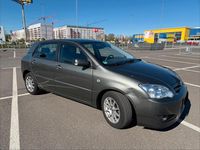 Używany Toyota Corolla 110 KM (80 kW) 2005 Szary Hatchback