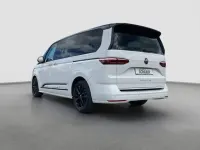 Gebraucht VW Multivan Pro 150 PS (110 kW) 2025 Weiß (candyweiß / deep black perlef) Van / Kleinbus