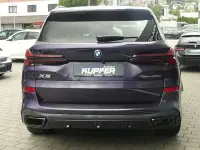 Gebraucht BMW X5 Performance 489 PS (359 kW) 2024 Sonderlack techno violett SUV