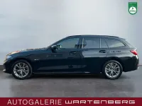 Gebraucht BMW 320e Sport Line 204 PS (150 kW) 2022 Schwarz Kombi