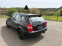 Second-hand Mazda 323F 98 CP (72 kW) 2002 Negru Berlinǎ