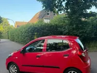 Gebraucht Hyundai i10 Edition 69 PS (50 kW) 2012 Rot Kleinwagen