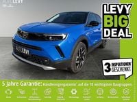 Gebraucht Opel Mokka-e Elegance 100 kW (136 PS) 2023 Voltaic blue met/typ aussenverkleidung m (metallic) SUV