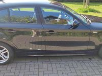 Second-hand BMW 116 122 CP (89 kW) 2011 Negru Hatchback
