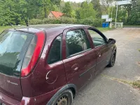 Second-hand Opel Corsa 59 CP (43 kW) 2005 Roșu Hatchback