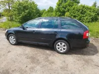 Używany Skoda Octavia Ambiente 122 KM (89 kW) 2011 Czarny Kombi