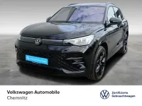 Gebraucht VW Tiguan R-line 272 PS (200 kW) 2025 0e grenadillschwarz metallic SUV