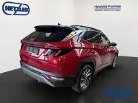 Gebraucht Hyundai Tucson Trend 150 PS (110 kW) 2021 Sunset red / phantom black / m SUV