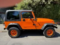 Gebraucht Jeep Wrangler 184 PS (135 kW) 1994 Orange SUV