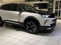 Gebraucht Opel Mokka-e Ultimate 100 kW (136 PS) 2023 Jade weiß (uni) SUV