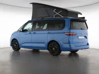 Gebraucht VW T7 Beach 245 PS (180 kW) 2026 Medium blue / deep black perleff Van
