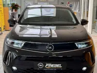 Gebraucht Opel Mokka-e 100 kW (136 PS) 2023 Diamant schwarz/karbon schwarz SUV