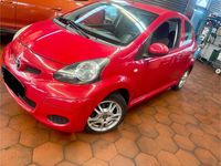 Gebraucht Toyota Aygo Cool 69 PS (50 kW) 2009 Rot Kleinwagen