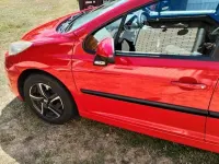 Gebraucht Peugeot 207 Premium 95 PS (69 kW) 2010 Rot Limousine