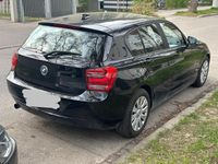 Second-hand BMW 116 116 CP (85 kW) 2012 Negru Hatchback