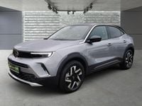 Gebraucht Opel Mokka-e Elegance 100 kW (136 PS) 2022 Kontrast grau/quarz silber SUV