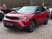 Gebraucht Opel Mokka 131 PS (96 kW) 2024 Lackierung rot rubi/typ aussen SUV