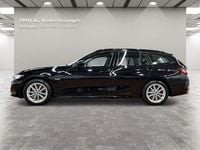 Gebraucht BMW 320e 163 PS (119 kW) 2022 Schwarz Kombi