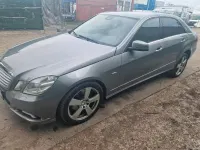 Second-hand Mercedes E250 150 CP (110 kW) 2009 Argintiu Berlinǎ