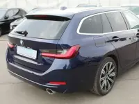 Gebraucht BMW 330 Comfort Edition 286 PS (210 kW) 2023 Tansanitblau ii metallic Kombi