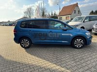 Używany VW Touran Active 150 KM (110 kW) 2021 Niebieski Minivan