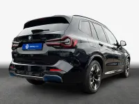Gebraucht BMW iX3 Impressive 210 kW (286 PS) 2023 M carbonschwarz metallic SUV