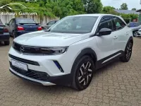 Gebraucht Opel Mokka-e Elegance 100 kW (136 PS) 2022 Jade weiss/arktis weiss SUV