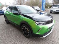 Gebraucht Opel Mokka-e Ultimate 100 kW (136 PS) 2021 Matcha green/ikone gruen SUV
