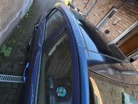 Second-hand Opel Corsa 80 CP (58 kW) 2009 Albastru Hatchback