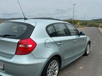 Second-hand BMW 118 143 CP (105 kW) 2009 Verde Hatchback
