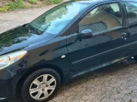 Gebraucht Peugeot 206 60 PS (44 kW) 2009 Schwarz Kleinwagen