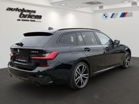 Gebraucht BMW 330e M Sport 292 PS (214 kW) 2021 Saphirschwarz Kombi