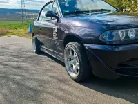 Używany Opel Astra Cabriolet 115 KM (84 kW) 1994 Purpurowy Kabriolet