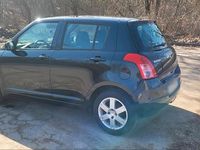 Gebraucht Suzuki Swift 92 PS (67 kW) 2010 Schwarz Kleinwagen