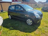 Second-hand Kia Picanto EX 65 CP (47 kW) 2006 Portocaliu Hatchback