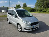 Gebraucht Ford Tourneo Courier Titanium 101 PS (74 kW) 2016 Silber Van / Kleinbus