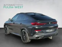 Gebraucht BMW X6 M50 Performance 530 PS (389 kW) 2022 Frozen black SUV
