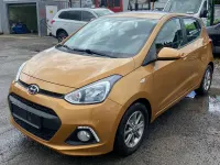 Gebraucht Hyundai i10 Trend 67 PS (49 kW) 2015 Mandarin orange / mic Kleinwagen