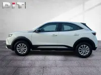 Gebraucht Opel Mokka Enjoy 131 PS (96 kW) 2023 Lack weiss banquise/typ aussenverkleidun (metallic) SUV